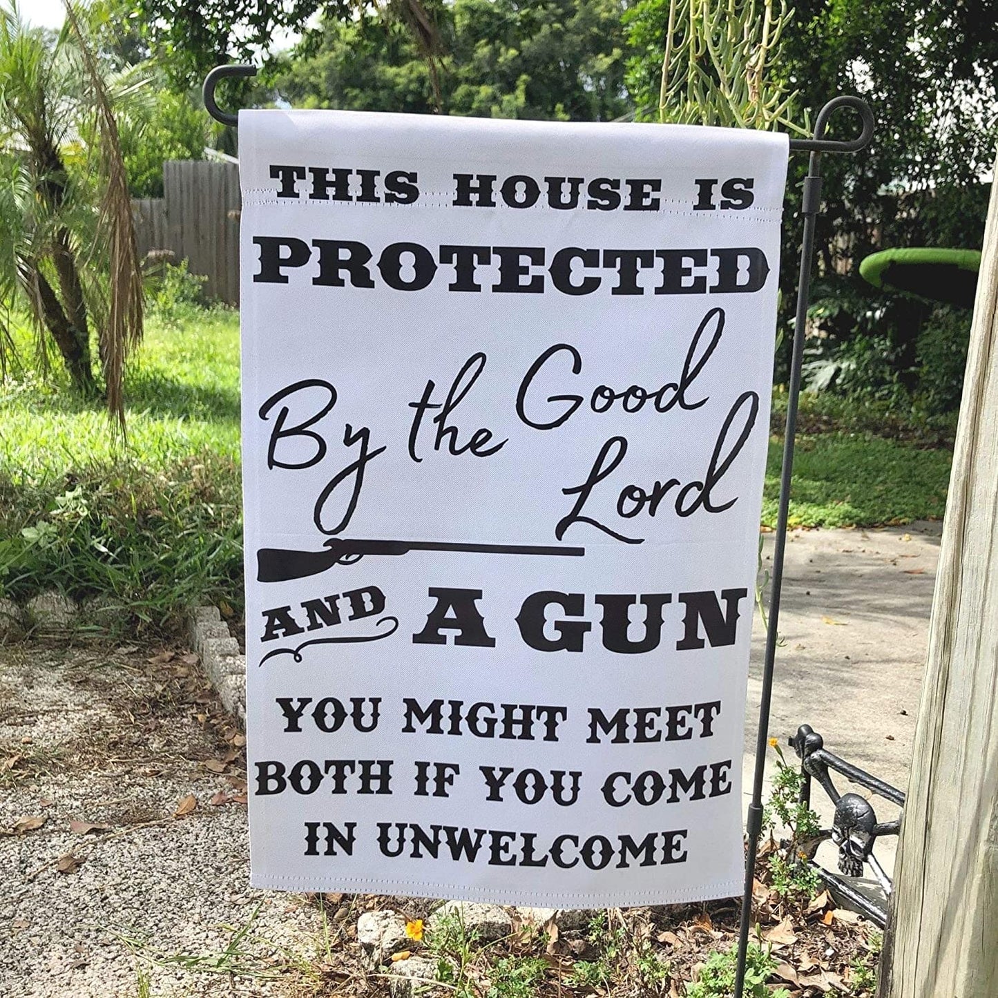 This House is Protected By The Good Lord and a Gun 18"x12" Garden Flag - 2 PIECES